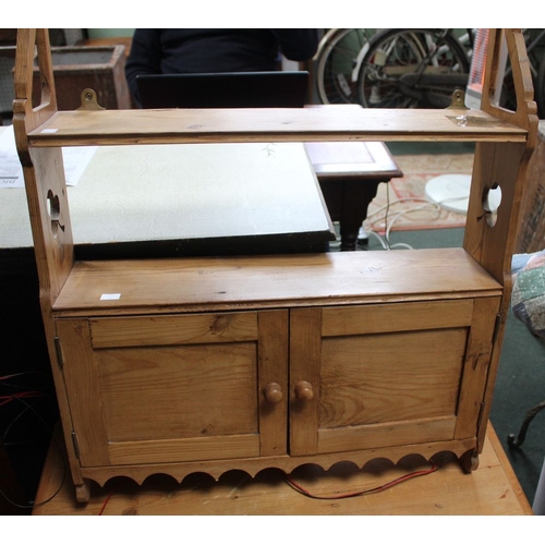 340 - A rustic pine wall hanging cupboard with two doors and open shelves