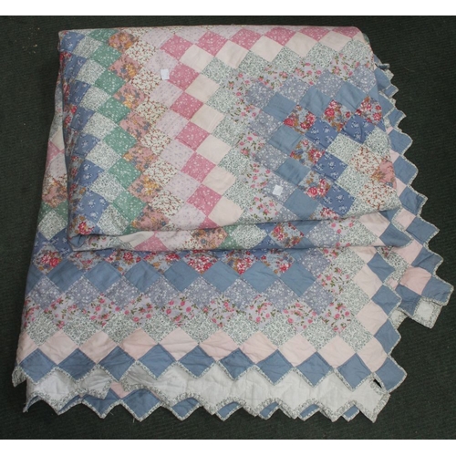 343 - A patchwork throw/bedspread, 266cm x 250cm