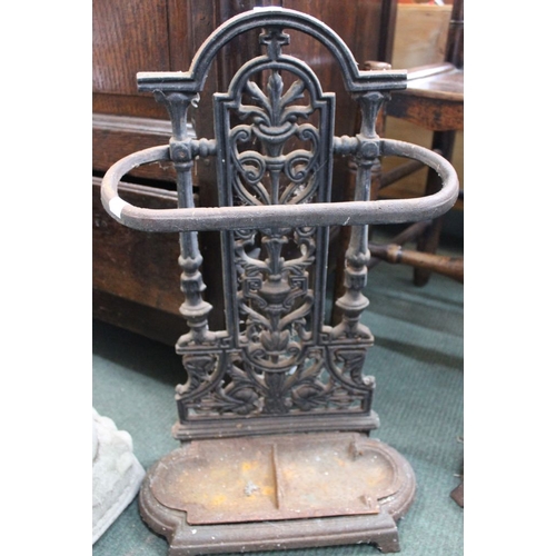 358 - A 19th century cast iron stick/umbrella stand of small proportions with original drip tray