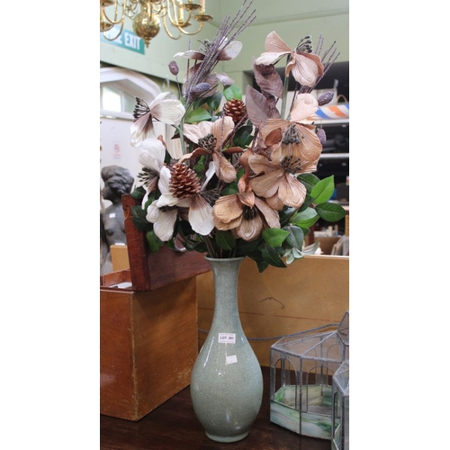 361 - A crackle glazed ceramic vase containing an ever lasting flower arrangement