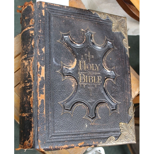 364 - A leather bound Victorian family bible with brass clasps and corners