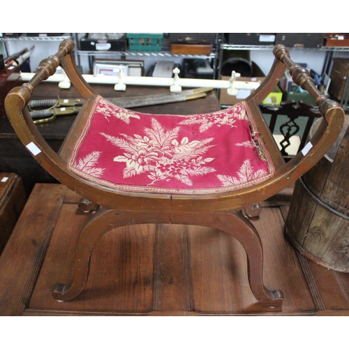 370 - A 19th century mahogany x-frame foot stool