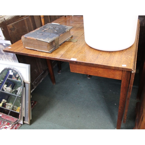 372 - A 19th century oak drop leaf table of typical form & construction