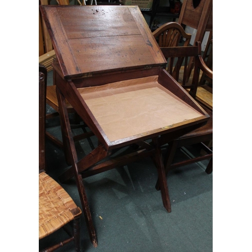 387 - A 19th century mahogany sloping scribes desk on x-frame support with skiver inset