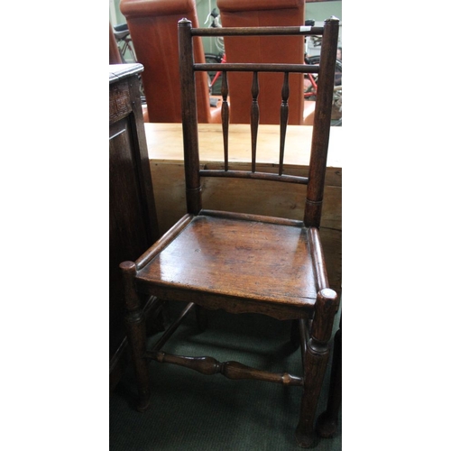 396 - a 19th century solid seated spindle back country chair