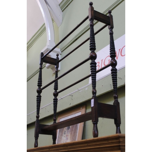 13 - A Victorian mahogany towel rail with unusual turned tapering supports