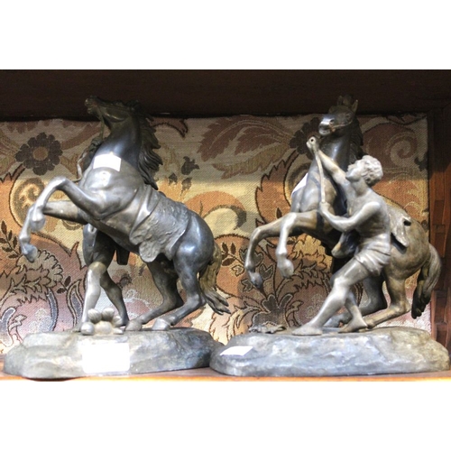 34 - A pair of spelter Marly horses, 25cm high