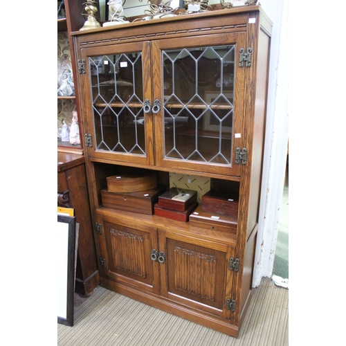 38 - An Old Charm style cabinet with glazed top