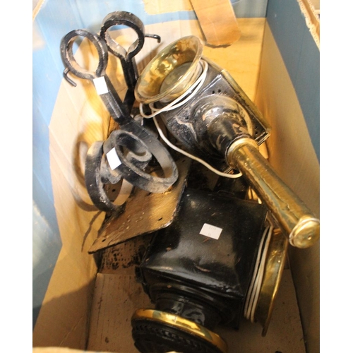 62 - A box containing a pair of carriage lanterns with a pair of wrought iron wall brackets