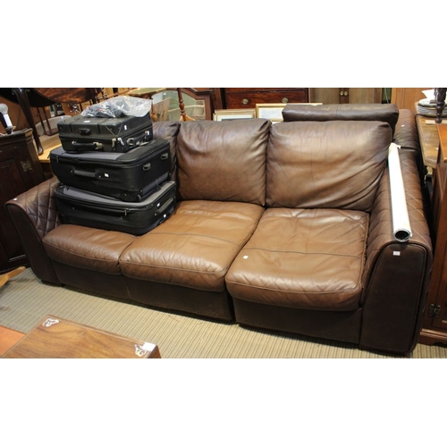 85 - A modern large leather three seater sofa with a single arm chair and large foot stool