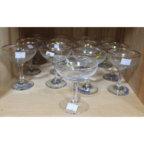 A collection of stemmed and branded Babycham glasses (13)