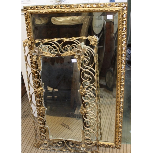 58 - A decorative wall mirror, fancy frame with rose sconces with a gilt framed bevel edged wall mirror &... 