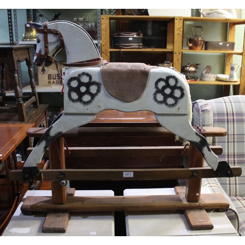 1 - A vintage wooden rocking horse