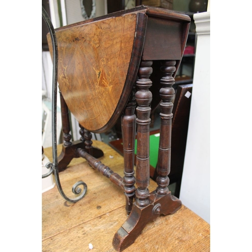 16 - A twin flap occasional table with inlaid fret work