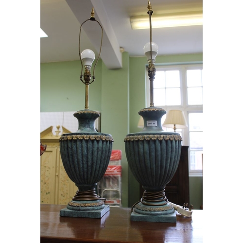 55 - A pair of jade green lamps