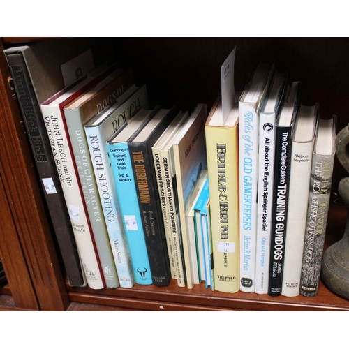 110 - A shelf containing a good selection of books relating to Field Sports