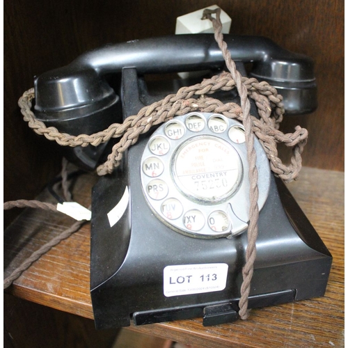 113 - A vintage black Bakelite telephone - Coventry 75230