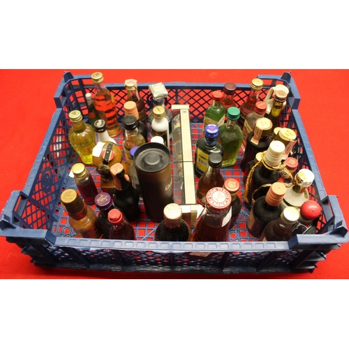 40 - Assorted miniature bottle of alcohol to include whisky etc 40 miniature bottles