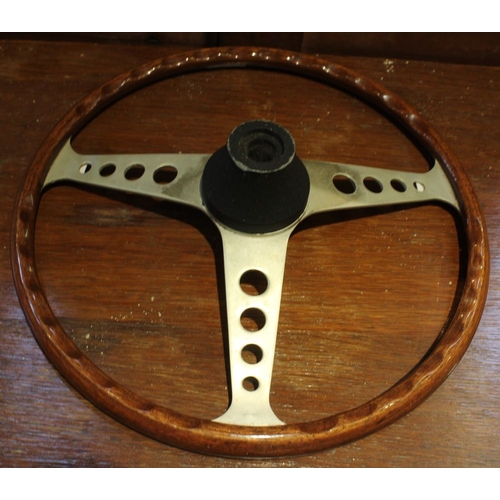 101 - A vintage wooden steering wheel with a Morris 