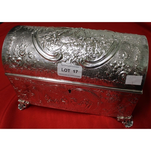 17 - An Edwardian silver table casket, having hinged domed lid, raised on cast feet, repousse decoration ... 