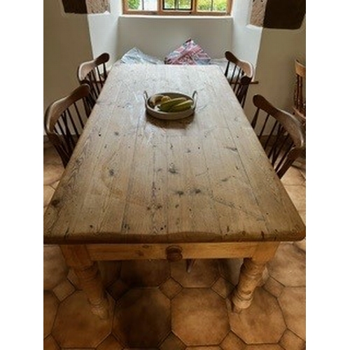 105 - A pine dining table with under drawer 6ft x 3ft