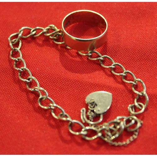 13 - A plain 9ct gold ring together with a 9ct gold wrist chain with padlock clasp, combined weight 11g