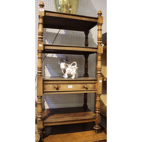 178 - A Victorian mahogany What-Not, fitted four tiers, one tier with drawer, having acorn finials, turned... 