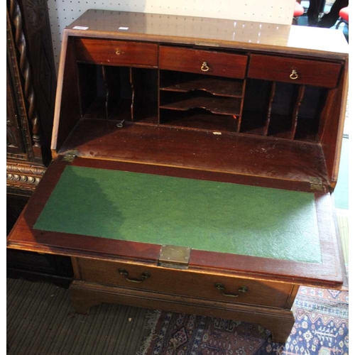 215 - An Edwardian mahogany fall front bureau, satinwood cross banded, fitted interior over two short & tw... 