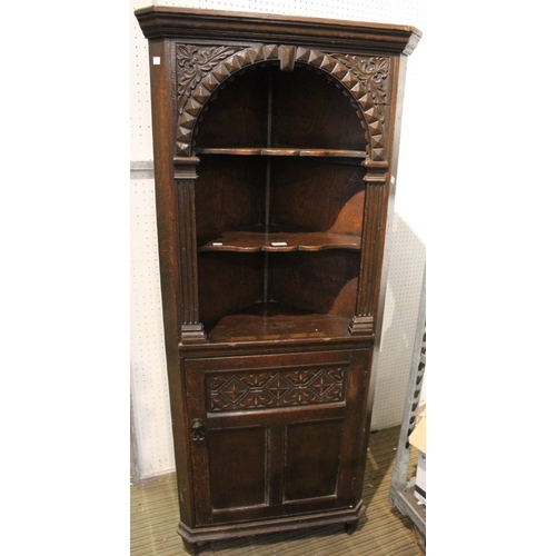 239 - An Old Charm style dark wood corner cupboard