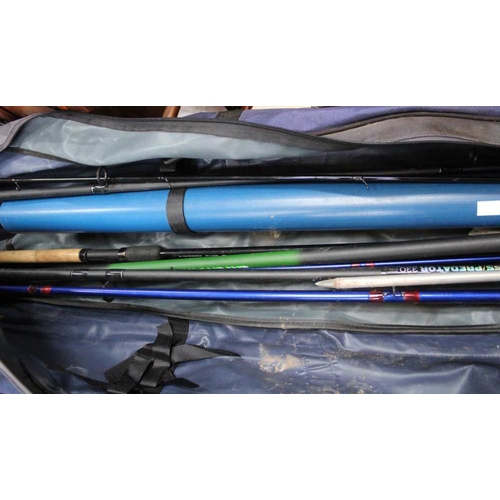 309 - A Matchtek carry bag with contents, two rods, reels etc