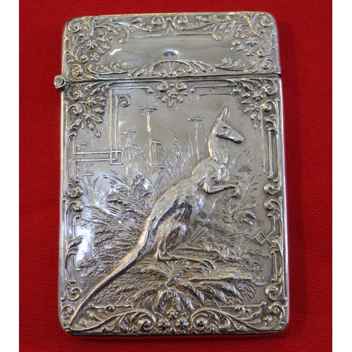 37 - An Edwardian silver visiting card case, embossed decoration of a Kangaroo in landscape, monogrammed,... 