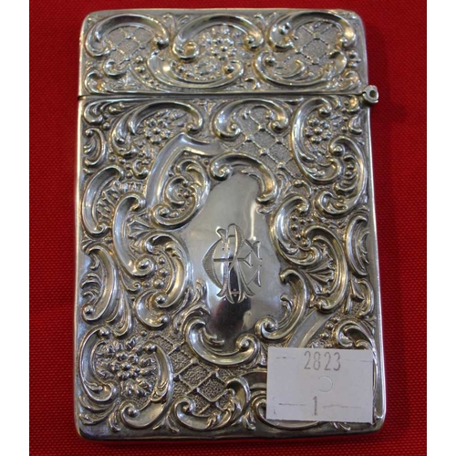 37 - An Edwardian silver visiting card case, embossed decoration of a Kangaroo in landscape, monogrammed,... 