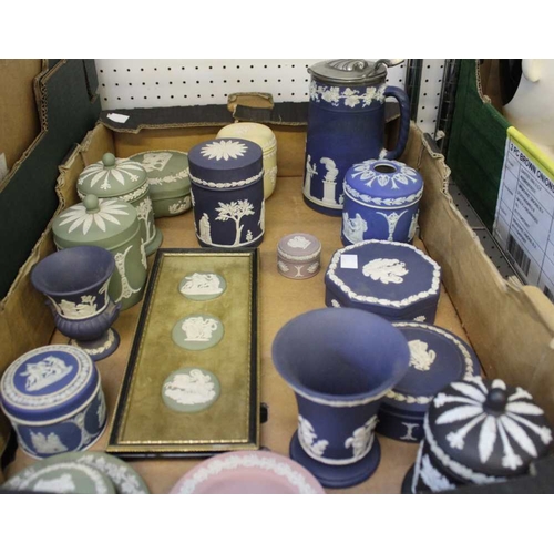 440 - A collection of Wedgwood Cameo wares, various ground colours include blue, green, cane yellow and la... 