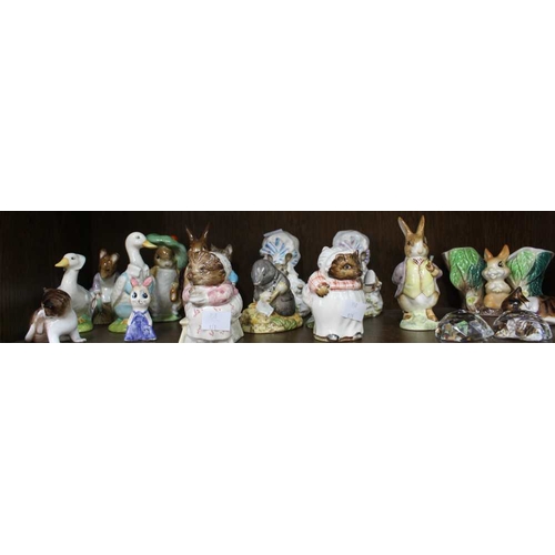 452 - A selection of Beatrix Potter Beswick ceramic figures with other similar items