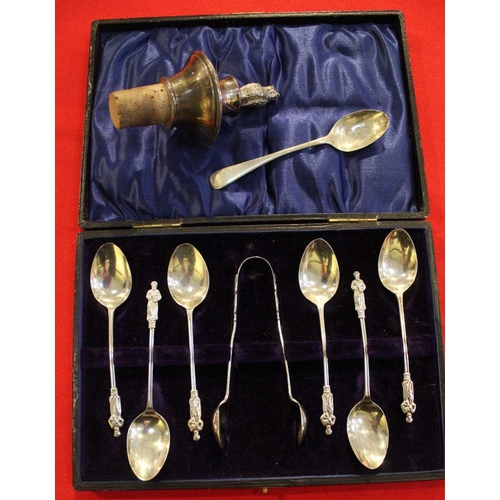 7 - A cased set of silver apostle coffee spoons with sugar tongs, a plain silver coffee spoon and a silv... 