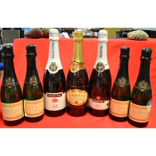 10 - Seven bottles of sparkling wine including Martini Asti (3 bottles and 4 halves)