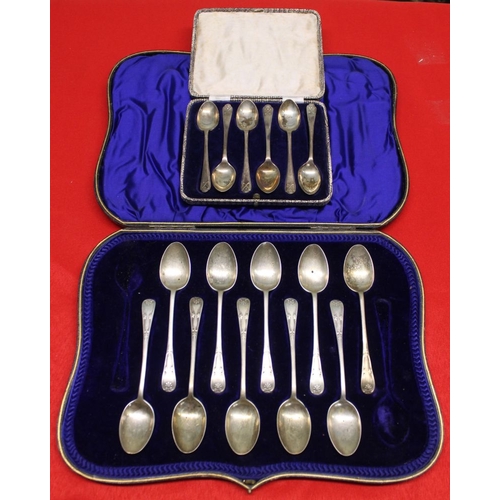 307 - A cased set of six silver coffee spoons with Golf club terminals, together with a part case of ten s... 