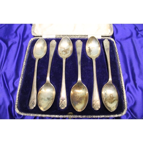 307 - A cased set of six silver coffee spoons with Golf club terminals, together with a part case of ten s... 