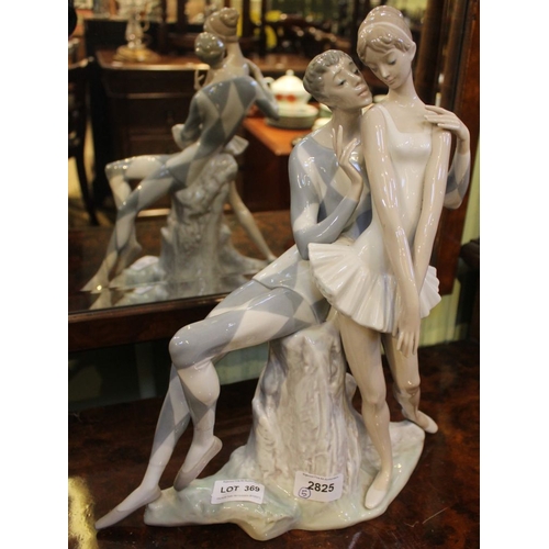 369 - A Lladro porcelain figure group of Pierrot & Ballerina, 36cm high