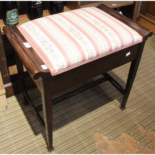 381 - A 20th century piano stool with upholstered hinged seat