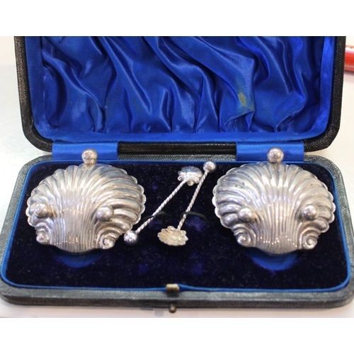 1 - A pair of silver scallop form salts with spoons in box