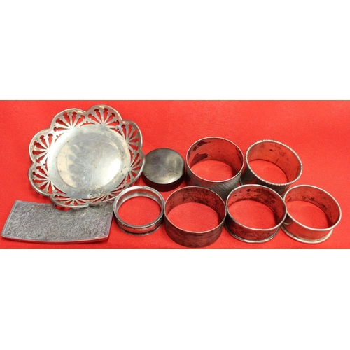 10 - A collection of hallmarked silver, includes six various napkin rings, a silver nut dish, pill box an... 