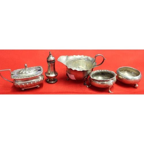 11 - A collection of hall marked silver items, includes two salts, a lidded mustard, a pepper pot and a s... 