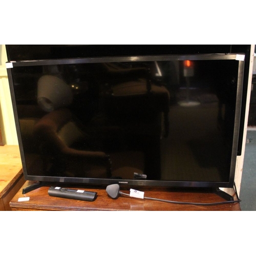 123 - A Samsung Television with remote set 32