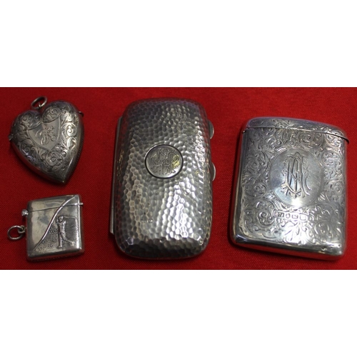 14 - A silver vesta case embossed with a golfer design, a hallmarked silver heart shape vesta, a Victoria... 