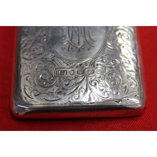 14 - A silver vesta case embossed with a golfer design, a hallmarked silver heart shape vesta, a Victoria... 