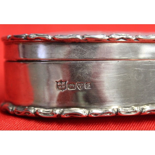 15 - George Nathan and Ridley Hayes, an Edwardian oval silver box, engine turned cover with blind cartouc... 