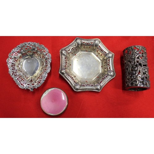 18 - Two silver hallmarked pin trays, a repousse silver cylinder and a silver powder compact with pink en... 