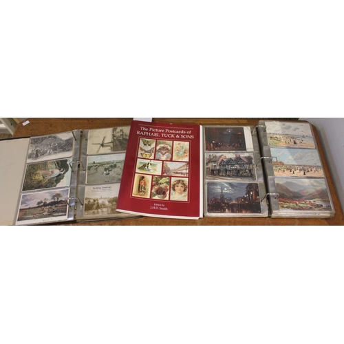 191 - Two postcard albums containing a collection of Raphael Tuck postcards, including Stratford-upon-Avon... 