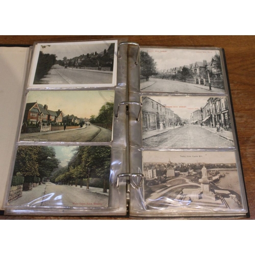 191 - Two postcard albums containing a collection of Raphael Tuck postcards, including Stratford-upon-Avon... 